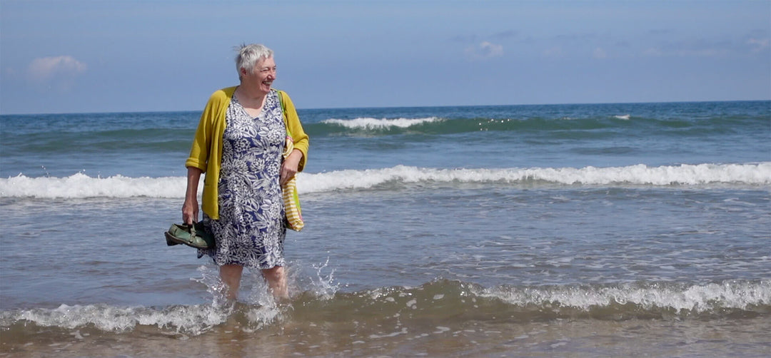 Out Story Banner: Kate Paddling In The Sea