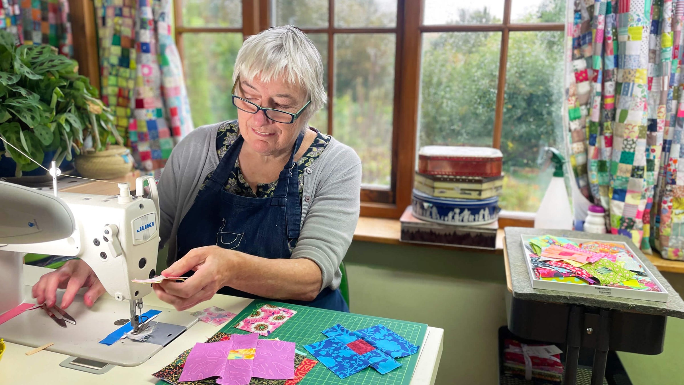 Kate Sewing At The Table